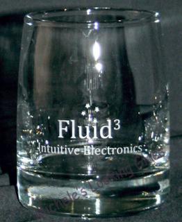 Logo etched onto whiskey glass