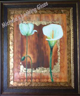 Inner frame highlights painting's gold leafing