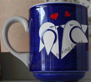 Engraved and painted coffee mug
