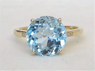 9k Yellow Gold 6.6ct Blue Topaz & Diamond Ring