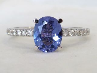 9k White Gold 1.28ct Tanzanite & 0.26ct Diamond Ring with Valuation