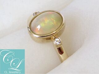 9k Yellow Gold Ethiopia Fire Opal & White Sapphire Ring