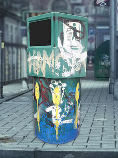 Green Plastic Graffiti Rubbish Bin