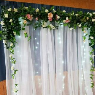 White Drapery with Flowers Backdrop