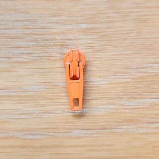 Orange zipper pull