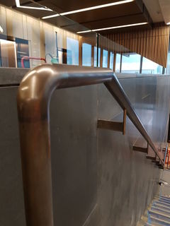 Brass tube handrail bronze patinaed