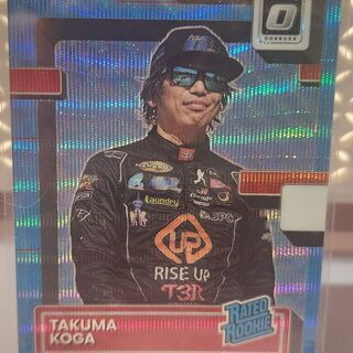 2023 Donruss NASCAR Optic Rated Rookie Takuma Koga #12 Carolina Blue Wave