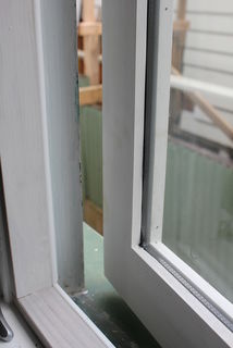 Aquamac Seal, fitted to timber bead to seal existing windows to eliminate heat loss