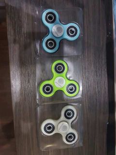 Fidgets that glow either yellow, green or blue