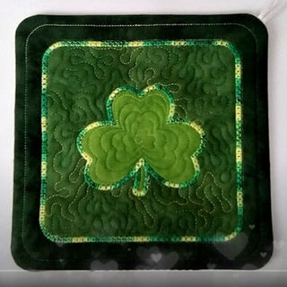 How to combine designs to make a Shamrock Coaster