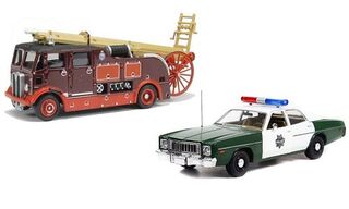 Diecast model fire engines and police cars