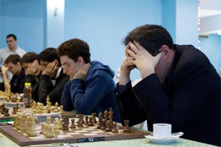 Russian Team Championship: 64 (Moscow) wins, by half a board point