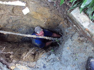 Tony replacing drain over two meters deep